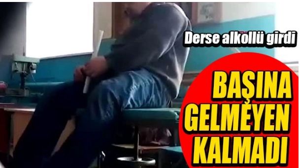DERSE ALKOLLÜ GİREN ÖĞRETMEN MASADAN DÜŞTÜ