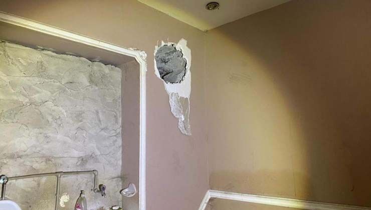 Duvarı delip 900 bin liralık altın çalan hırsız tutuklandı