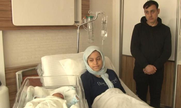 9 aylık hamile eşini balkondan atarak kurtardı