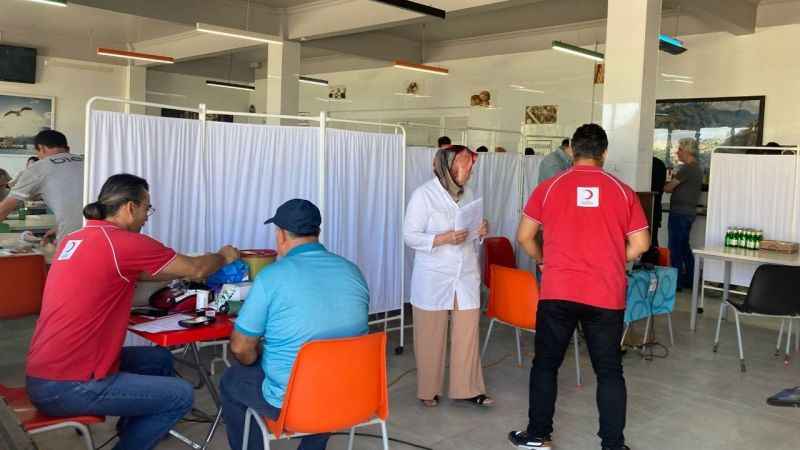 Rekor kan bağışı yapan vatandaşa altın madalya Rekor kan bağışı yapan vatandaşa altın madalya