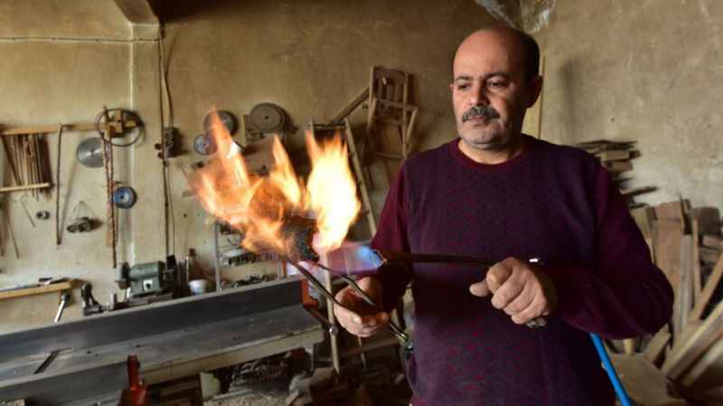 Bin yıllık ceviz ağaçlarından sanat eseri bastonlar