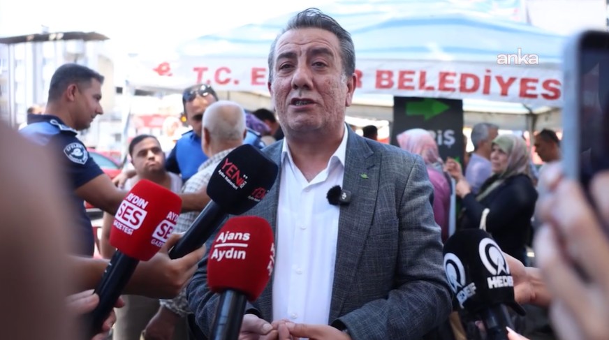 Aydın Büyükşehir Belediyesi ekipleri, Efeler Belediyesi'nin Zafer Meydanı'nda aşure hayrına izin vermedi