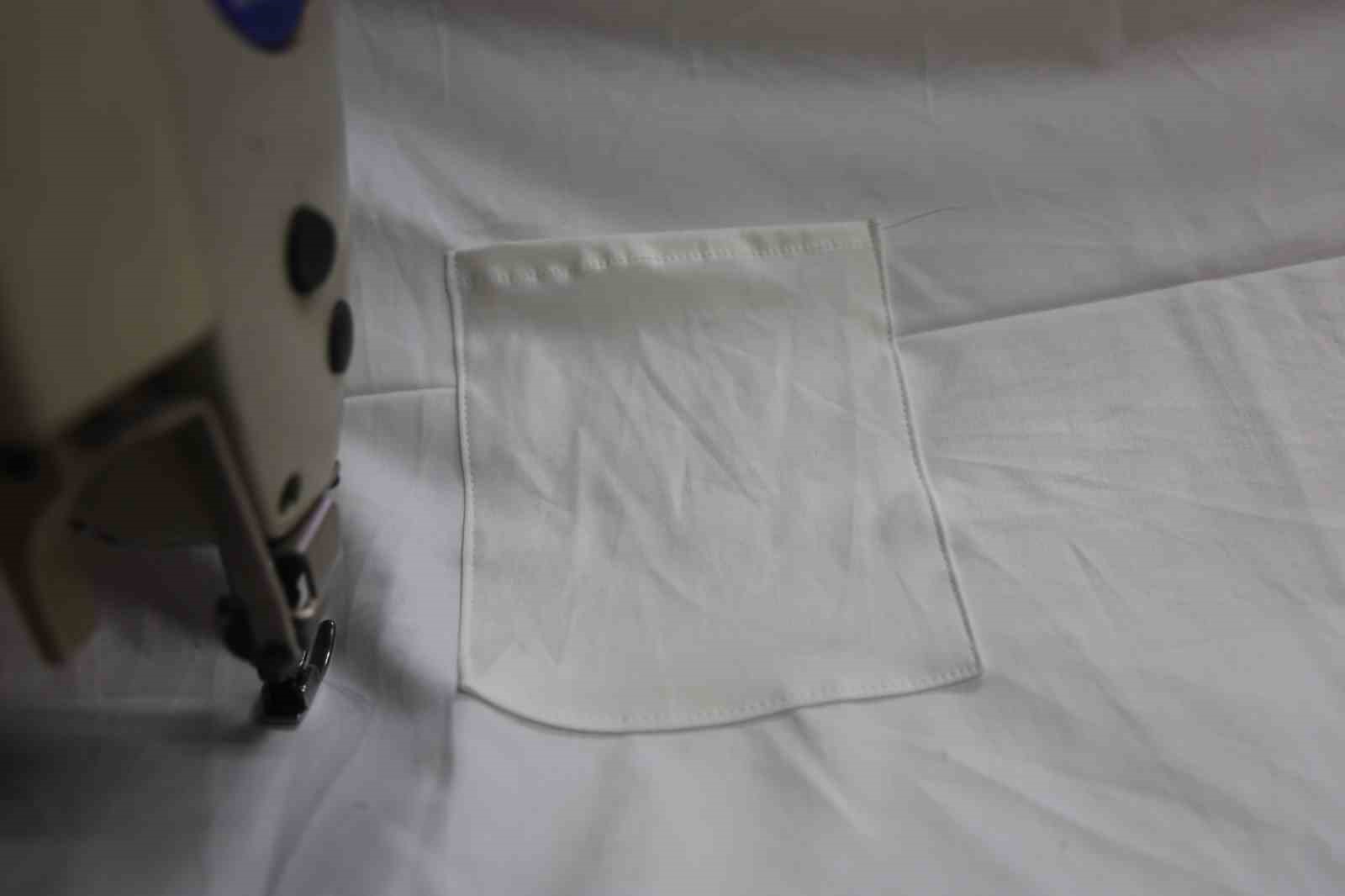 İş yerinin camına astığı "Kefene cep dikilir" yazısıyla ilgi odağı olan esnaf, yazıyı cimrilerin inadına kaldırmıyor
