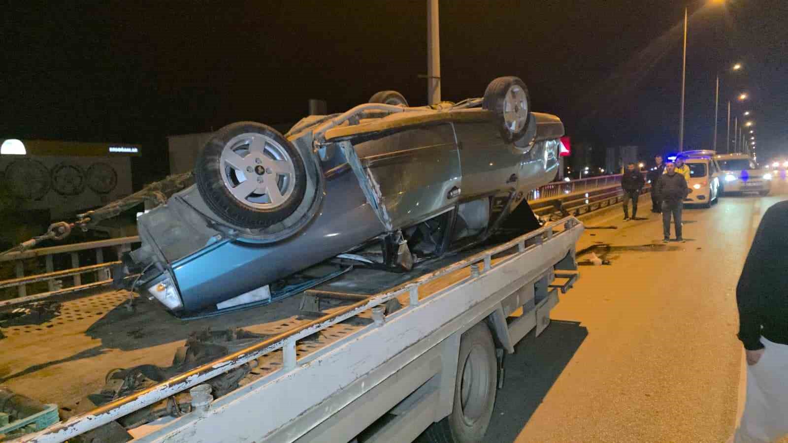 Takla atan otomobilden burunları bile kanamadan çıktılar
