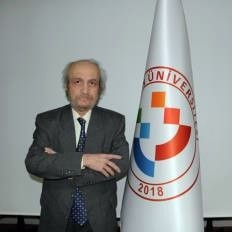 Üniversitenin lojmanında ölü bulundu
