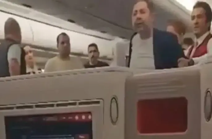 Uçakta vatandaşa ve personele bağıran Özcan görevden alındı